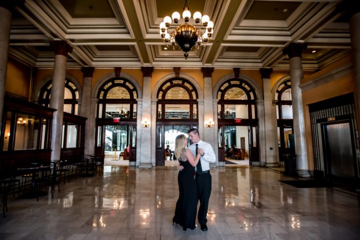 Newly engaged couple share a dance in the lobby of Main Street Train Station in downtown Richmond, VA