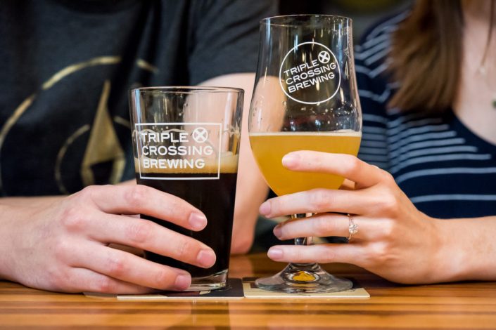Show off the engagement ring at local brewery where the couple first met