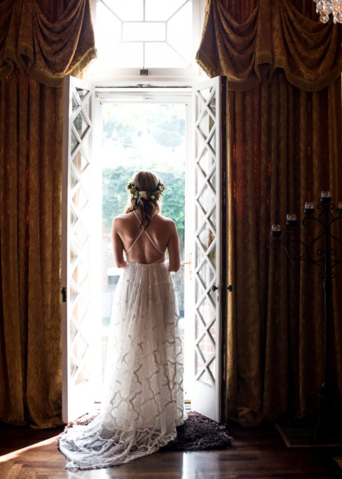 Silhouette portrait of bride in doorway at Historic Manakin Mansion in Richmond, VA