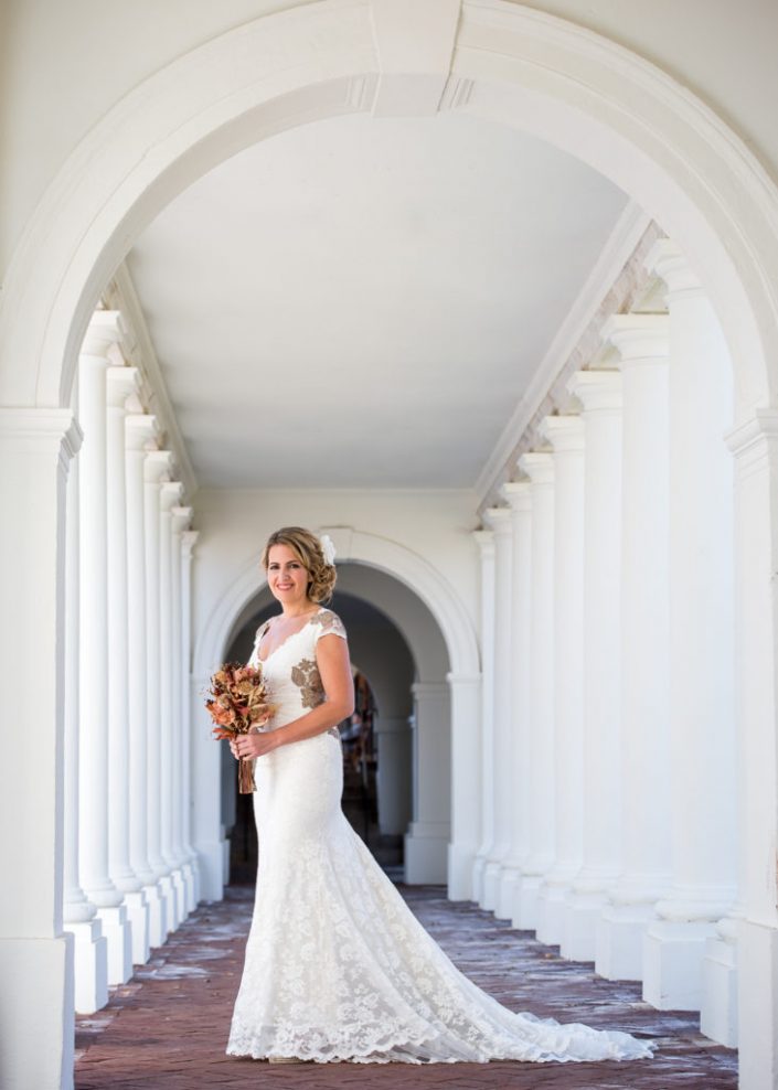 Stunning bridal portrait in hallway at University of Virginia campus by affordable wedding photographer