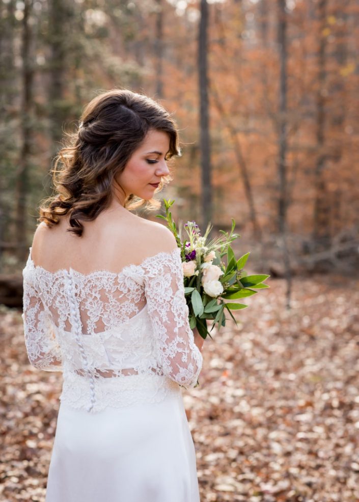 Bride poses in handmade custom gown in the woods at Pocontas State Park in Chesterfield, VA