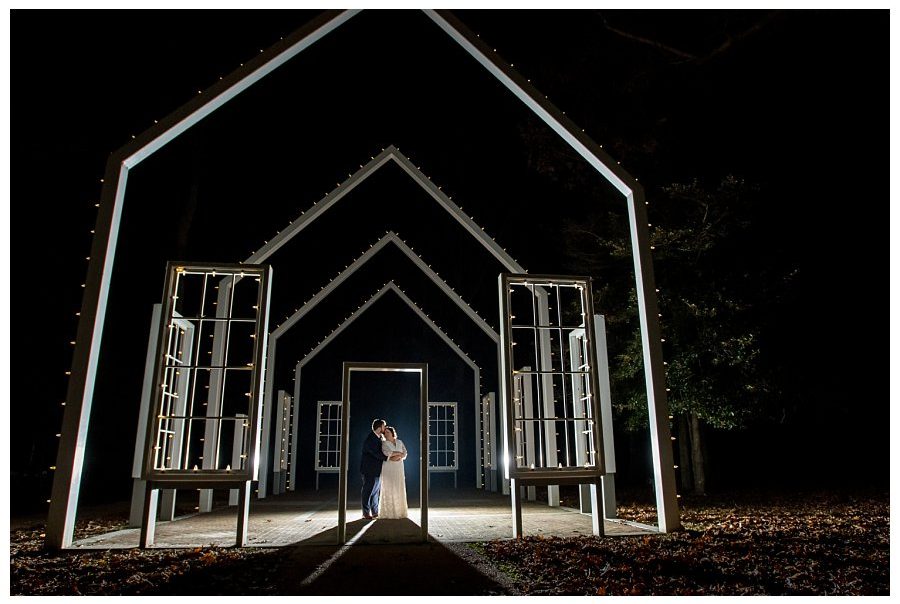 Night portrait of the bride and groom at Historic Pole Green Church in Mechanicsville VA