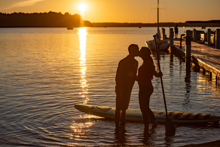 Sunset engagment session on the water at Sunday Park, Chesterfield VA with paddleboard
