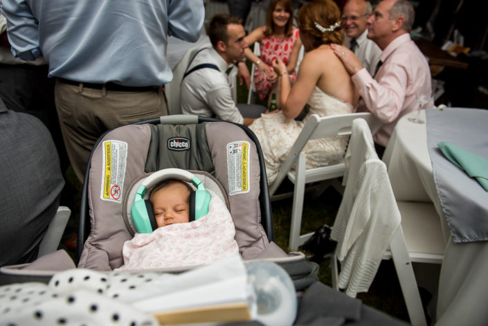 A baby sleeps while the party continues at Charlottesville Wedding reception
