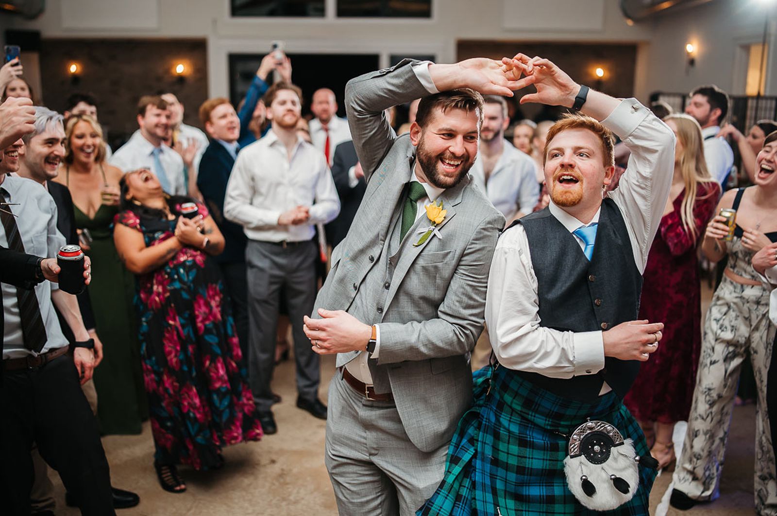 LGBTQ wedding couple dancing at Oakdale