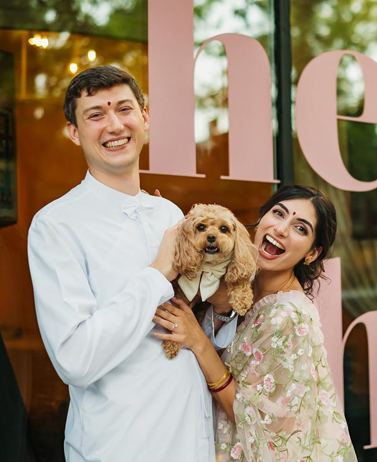 Happy couple with dog in Richmond VA wedding photographer