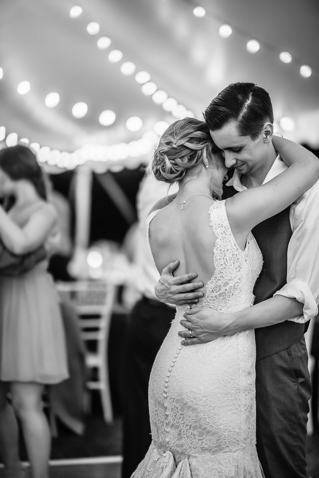 bride and groom slow dance together at Historic Polegreen Church