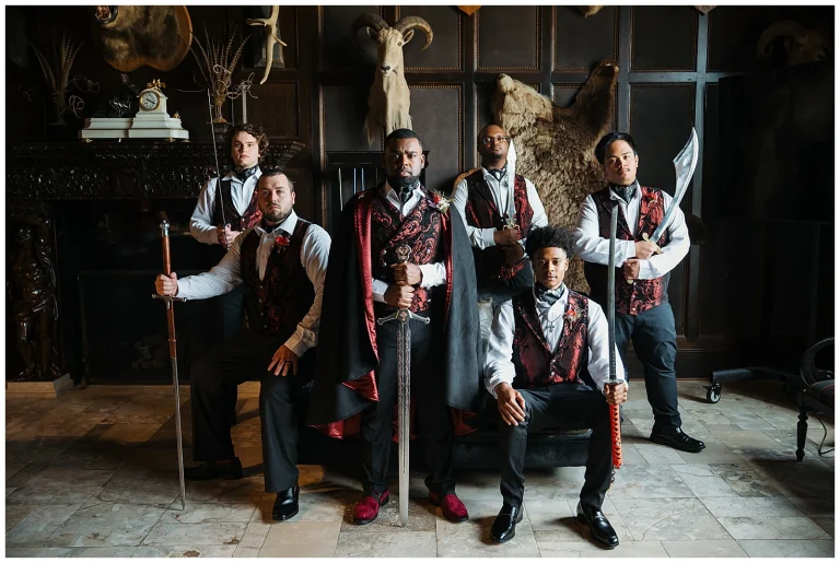 Groomsmen with swords at in the Billiards Room Dover Hall