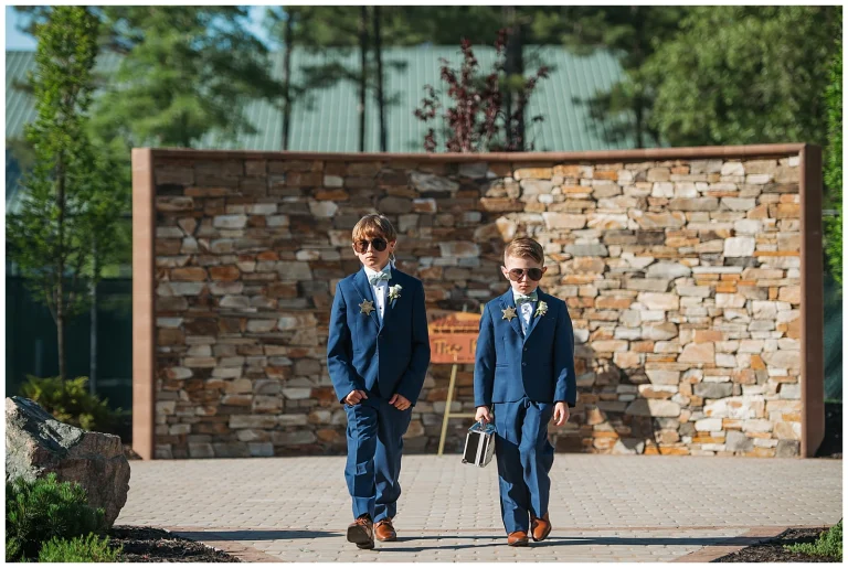 Ring bearers walk down the aisle at Brandermill Country Club
