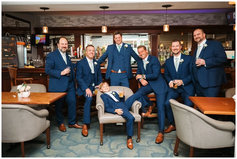 Groomsmen hand out at the bar at Brandermill Country Club in Midlothian VA