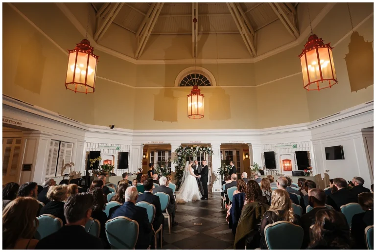 A wedding ceremony in the atrium at Lewis Ginter