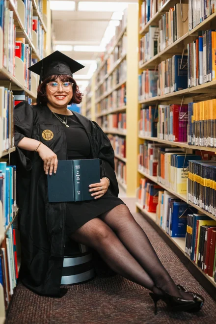 College senior photos in the library